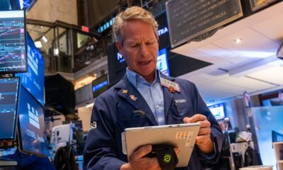 Dow jumps 200 points as strong earnings overshadow China trade fight, Bank of America rises: Live updates