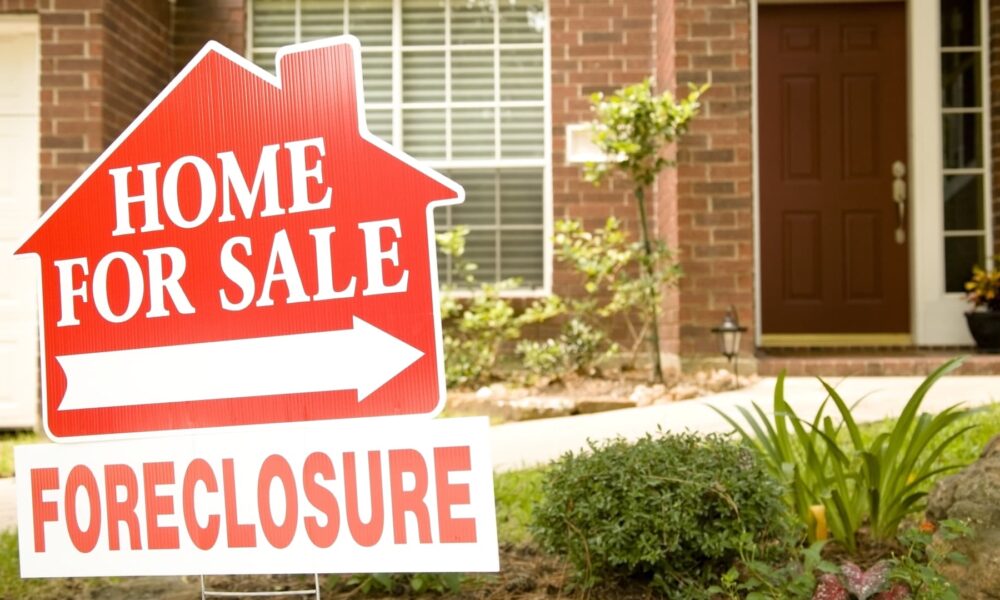 Foreclosures rise in October, a sign of housing market distress